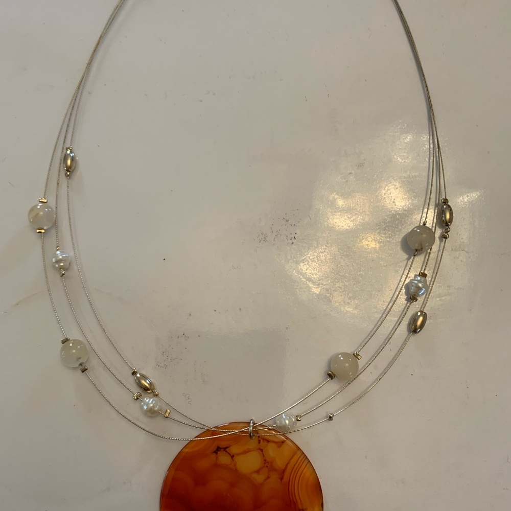 Elegant Multi-Strand Necklace with Orange Pendant